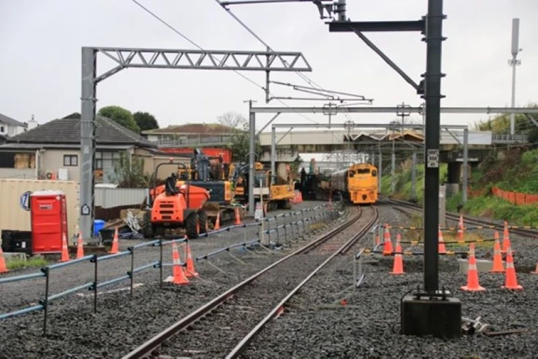 Thumbnail image for article titled 'Auckland's $21b question: What comes first, more rail or moving the port?'